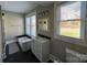 Clean bathroom with a bathtub, vanity and window at 4541 Hall Dairy Rd, Claremont, NC 28610
