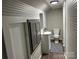 Small bathroom with sink, toilet and cabinet at 4541 Hall Dairy Rd, Claremont, NC 28610