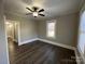Bedroom with hardwood floors and large windows at 4541 Hall Dairy Rd, Claremont, NC 28610