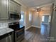 Modern kitchen featuring stainless steel appliances and granite countertops at 4541 Hall Dairy Rd, Claremont, NC 28610