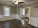 Spacious living room featuring hardwood floors and large windows at 4541 Hall Dairy Rd, Claremont, NC 28610