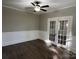 Living area with hardwood floors and French doors at 4541 Hall Dairy Rd, Claremont, NC 28610