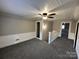 Spacious upper hallway with ceiling fan and access to bedrooms at 4541 Hall Dairy Rd, Claremont, NC 28610