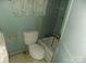 Bathroom with old fixtures and worn flooring at 523 Hoyle St, Dallas, NC 28034