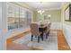 Formal dining room with hardwood floors and chandelier at 7381 Bay Cove Ct, Denver, NC 28037