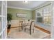 Bright home office with built-in shelving and hardwood floors at 7381 Bay Cove Ct, Denver, NC 28037