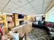 Large basement recreation area with a stone fireplace at 121 48Th Ne Ave, Hickory, NC 28601