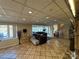 Lakefront basement with tiled floors, a comfortable seating area, and scenic views at 121 48Th Ne Ave, Hickory, NC 28601