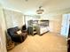 Relaxing bedroom with a bunk bed and comfortable armchair at 121 48Th Ne Ave, Hickory, NC 28601