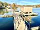 Wooden walkway to a covered boat dock on lake at 121 48Th Ne Ave, Hickory, NC 28601