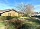 Landscaped front yard with mature shrubs and trees at 121 48Th Ne Ave, Hickory, NC 28601