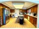 Kitchen with island, wood cabinets, and stainless steel appliances at 121 48Th Ne Ave, Hickory, NC 28601