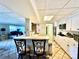 Basement kitchen with an island and white cabinets at 121 48Th Ne Ave, Hickory, NC 28601