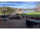 Relaxing lake view from sunroom with comfy seating at 121 48Th Ne Ave, Hickory, NC 28601