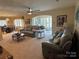 Spacious living room with view to sunroom and lake at 121 48Th Ne Ave, Hickory, NC 28601