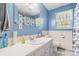 Clean bathroom with single sink vanity, shower, and toilet at 1314 Frederick St, Shelby, NC 28150