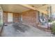 Brick covered porch with space for seating at 1314 Frederick St, Shelby, NC 28150