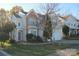 Two-story house with stone accents and a two-car garage at 2125 Arbor Vista Dr, Charlotte, NC 28262