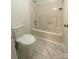Bathroom with a toilet, bathtub, and tiled floor at 213 Eastwood Dr, Salisbury, NC 28146