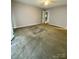 Spacious bedroom with carpet and access to another room at 213 Eastwood Dr, Salisbury, NC 28146