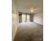 Bright bedroom featuring sliding glass doors and a ceiling fan at 213 Eastwood Dr, Salisbury, NC 28146