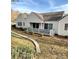Back exterior view showing patio and landscaping at 213 Eastwood Dr, Salisbury, NC 28146