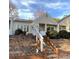 Inviting exterior of charming condo with brick steps and landscaping at 213 Eastwood Dr, Salisbury, NC 28146