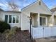 Front view of the house with a white picket fence at 213 Eastwood Dr, Salisbury, NC 28146