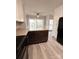 Updated kitchen with island and view to dining area at 213 Eastwood Dr, Salisbury, NC 28146