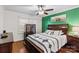 Comfortable bedroom with wood accents and unique bedding at 230 Feimster St, Statesville, NC 28677