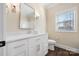 Clean bathroom with white vanity, single sink, and toilet at 2988 Old Salisbury Concord Rd, Concord, NC 28025