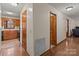 Hardwood floor hallway connecting the living areas to the kitchen and bedrooms at 325 Fairfield Ct, Mount Gilead, NC 27306