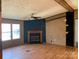 Spacious living room featuring a fireplace and hardwood floors at 4966 Lineberger Loop Rd, Denver, NC 28037