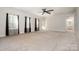 Bright main bedroom with ensuite bathroom access and ceiling fan at 717 Cherry Hills Pl, Rock Hill, SC 29730