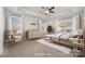 Virtually staged main bedroom with dresser and large bed at 717 Cherry Hills Pl, Rock Hill, SC 29730