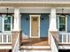 Inviting front porch with craftsman style columns and a charming light brown door at 805 Digby Rd, Rock Hill, SC 29730