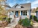 Craftsman style home with blue siding, brick accents, and a front porch at 805 Digby Rd, Rock Hill, SC 29730