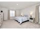 Comfortable bedroom with a queen-size bed and neutral decor at 913 Deep River Way, Waxhaw, NC 28173