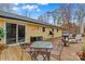 Spacious deck with fire pit, seating, and wooded views at 105 Buckingham Pl, Statesville, NC 28625