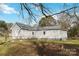 Side view of the house, showcasing gray siding and landscaping at 126 Charlotte St, York, SC 29745