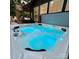 Luxurious hot tub with blue LED lighting, perfect for relaxation at 13538 Pine Harbor Rd, Charlotte, NC 28278