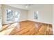 Hardwood floor bedroom with neutral walls and two windows at 2129 James Ct, Rock Hill, SC 29732