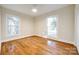 Bright bedroom with hardwood floors and large windows at 2129 James Ct, Rock Hill, SC 29732