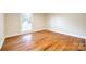 Bright bedroom with hardwood floors and large window at 2129 James Ct, Rock Hill, SC 29732