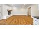 Gathering room with hardwood floors and a white brick fireplace at 2129 James Ct, Rock Hill, SC 29732