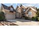 Two-story house with attached garage and stone accents at 3417 Millstone Creek Rd, Lancaster, SC 29720