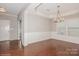 Bright dining room with hardwood floors and chair railing at 5043 Weber Ct, Fort Mill, SC 29715