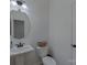 Clean powder room with pedestal sink and toilet at 5971 Trinity Crossing Cir, Kannapolis, NC 28081