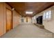 Finished basement with wood paneling and a fireplace at 608 Hanover Dr, Shelby, NC 28150