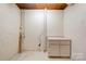 Unfinished basement with laundry hookups and storage at 608 Hanover Dr, Shelby, NC 28150